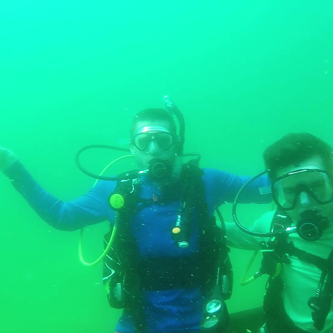 L'SPACE student Lance Belobrajdic on the left and Ryan Petre on the right at the Blue Lagoon Lake in Huntsville, Tx as part of the Texas A&M University Dive Club. As an oceanographer in training, it is important maintain diving abilities to collect data/chemistry/biology samples for research.